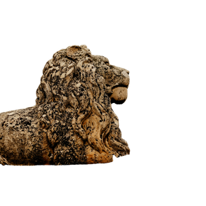 A Statue Of A Lion Is Shown Against A Gray Sky – cat PNG with transparent background